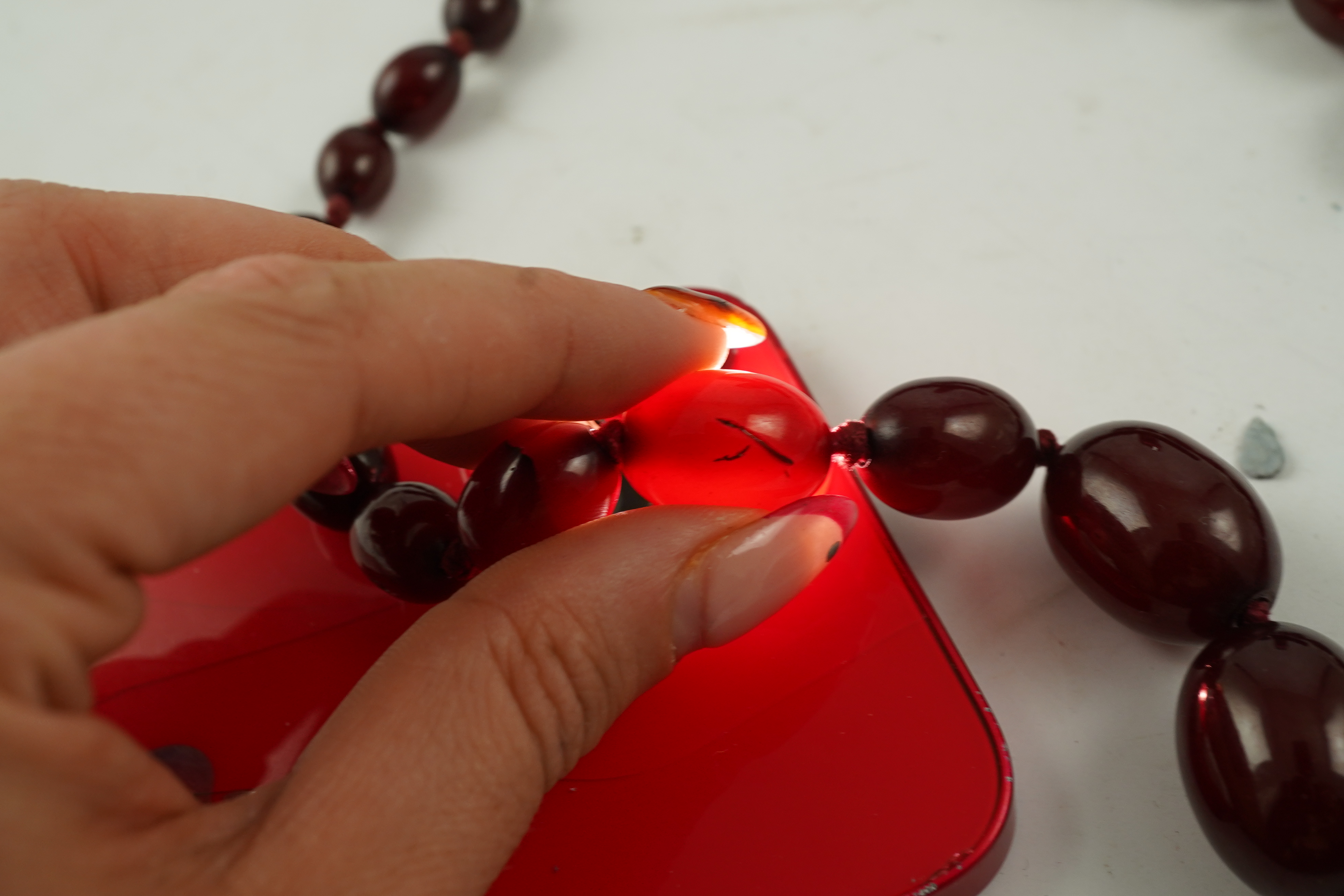 A cherry bakelite 'amber' necklace